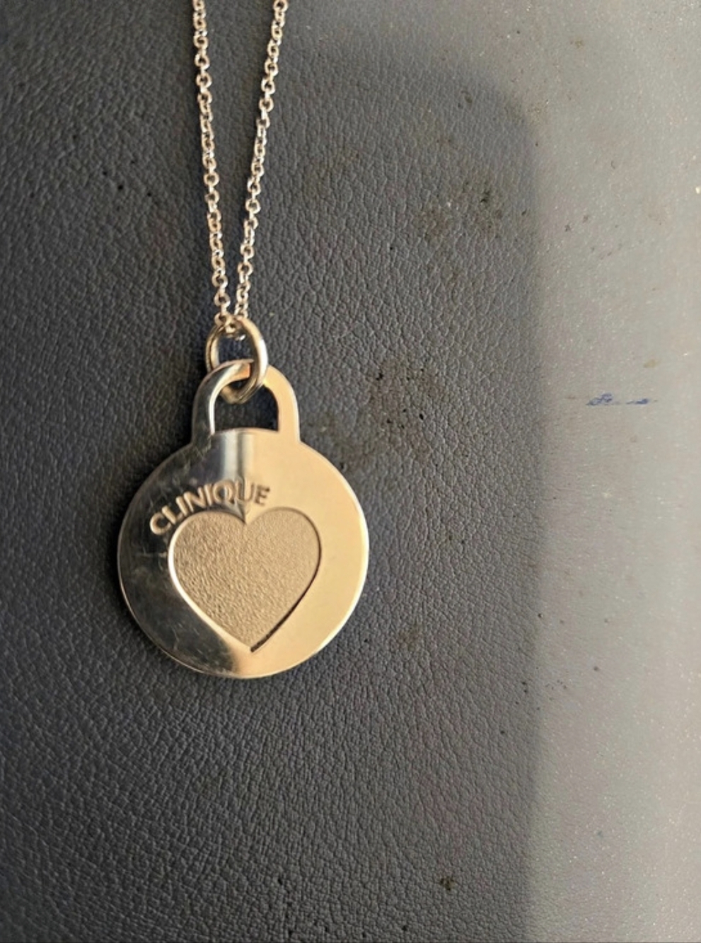 TIFFANY & CO. STERLING SILVER 925 CLINIQUE PENDANT ON 9 INCH CHAIN